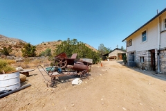 Bloom-Ranch-White-House-Rusted-Shacks-Image-_018