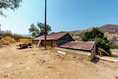 Bloom-Ranch-White-House-Rusted-Shacks-Image-_045